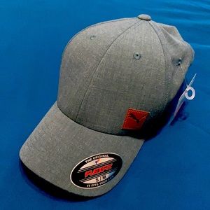 Brand new Puma cap never used have tags. Size S/M